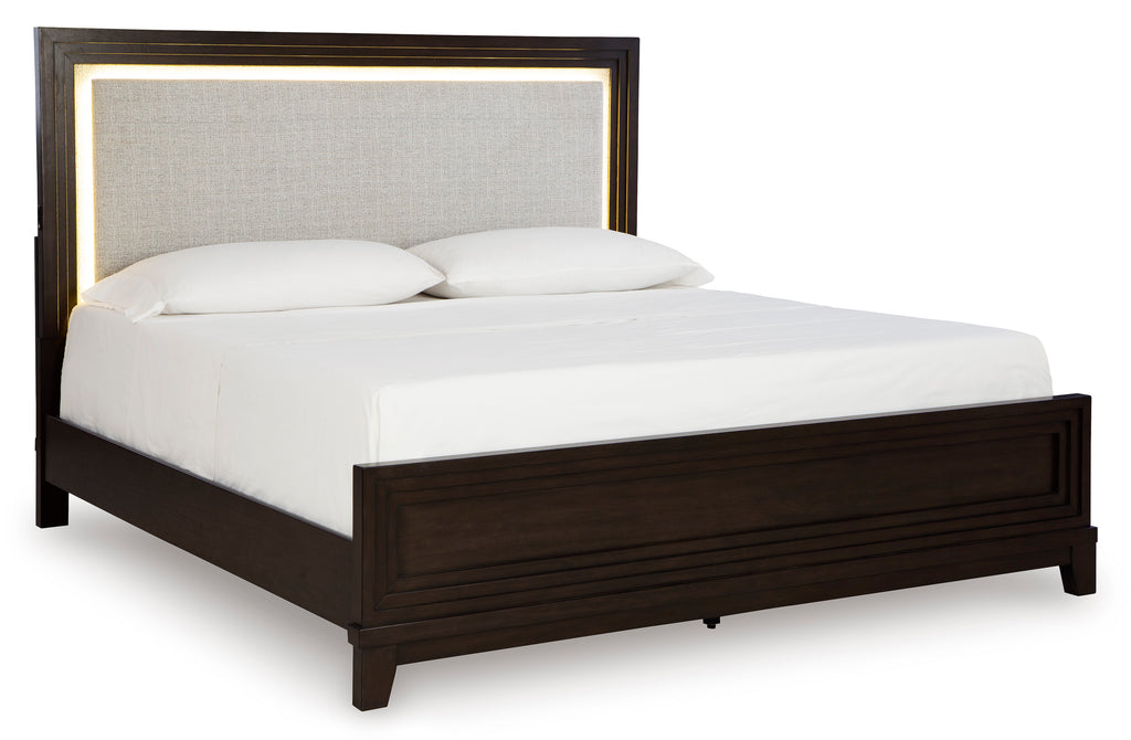 Neymorton King Upholstered Panel Bed - Dark Grayish Brown